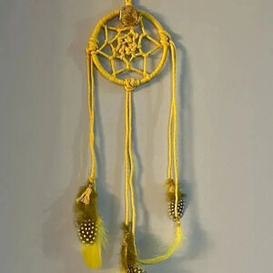 Lorena Espinoza Designs handmade yellow dream catcher with gemstone